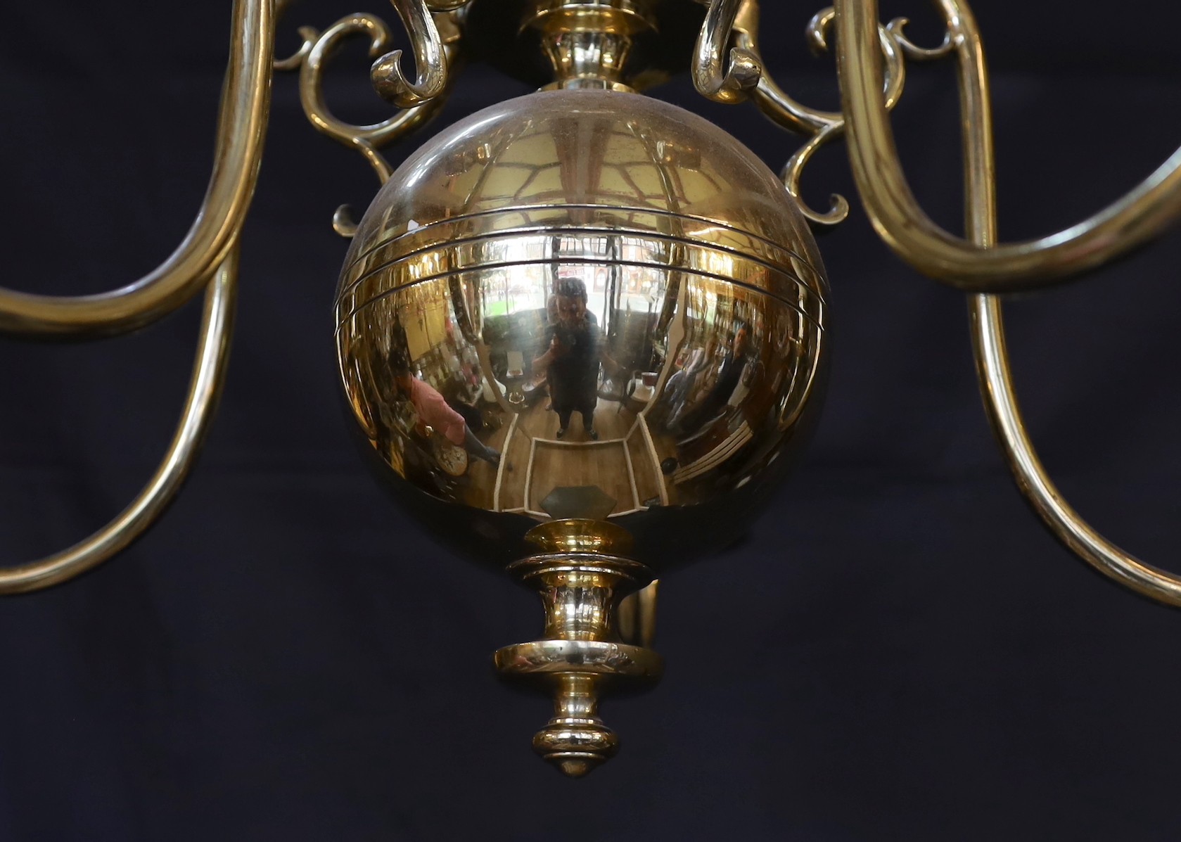 A Dutch style polished brass five light chandelier, height 48cm. width 62cm